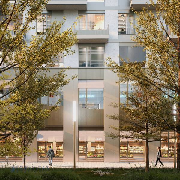 , 3-izbový byt s predzáhradkou, Brenner – Residence, Ružinov. - Exteriér na Mlynských nivách v Bratislave-Ružinove s obchodmi a drevinami pred budovou.