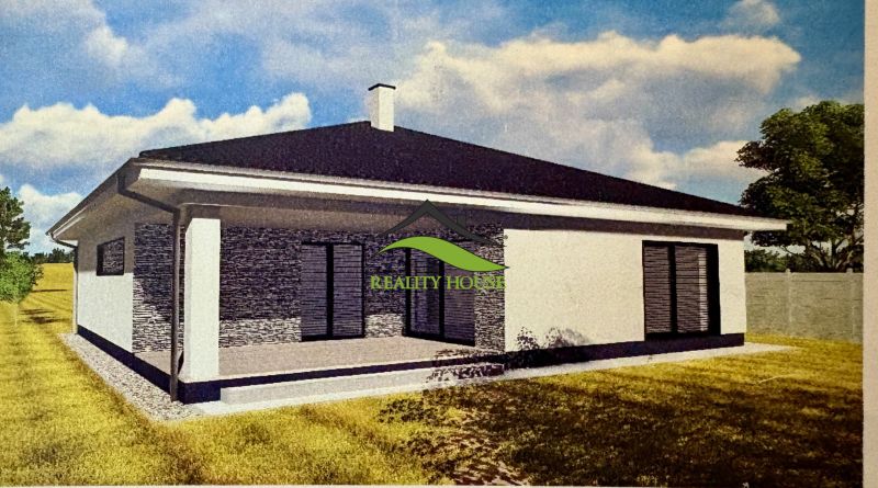 NOVOSTAVBA  - Rozostavaný bungalov v obci Dúbravka - Rodinný dom v Dúbravke s plochou strechou, terasou a okolitou zeleňou.