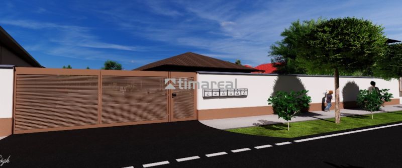 * novostavba moderného 3i domu, Vlčany, centrum - Brána a plot rodinného domu na Hlavnej ulici vo Vlčanoch, lemované stromami a chodníkom.