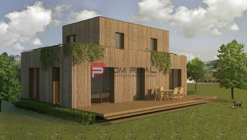 PREDAJ nádherný pozemok Borinka všetky siete + super výhľad - Dvojpodlažný dom s terasou obklopený zeleňou na pozemku vhodnom pre bývanie v Borinke.