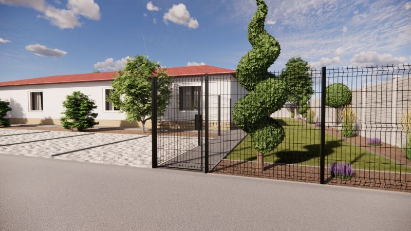 NA PREDAJ 3-IZBOVÝ RD (ČASŤ DVOJDOMU), ZEMIANSKA OLČA - Rodinný dom v Zemianskej Olči s upravenou záhradou a dekoratívnymi stromami za plotom.