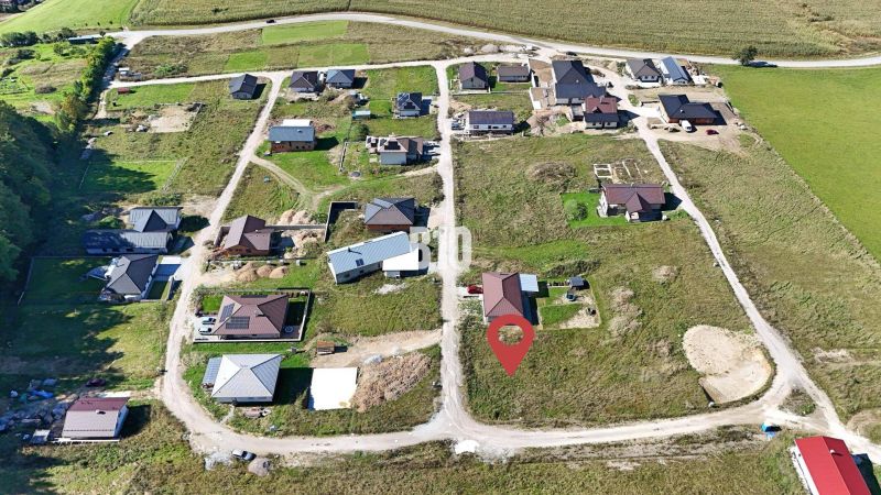 Stavebný pozemok na predaj - Necpaly - Letecký pohľad na rozvíjajúce sa pozemky na bývanie v Necpaloch so stavebnými parcelami.
