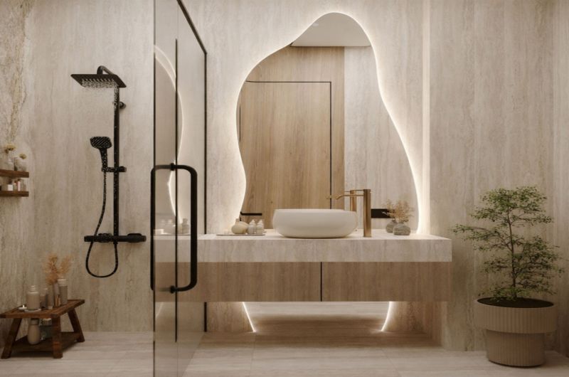 Predaj 2-izbového bytu, Zanzibar - Elegantná kúpeľňa s moderným sprchovacím kútom a podsvieteným zrkadlom v 2-izbovom byte.