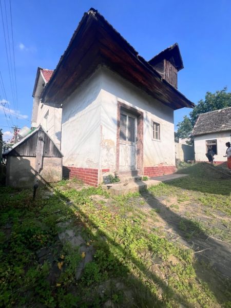 Na predaj vidiecky rodinný dom - Žarnovica/Brehy D045ZL - Rodinný dom v obci Brehy, Nová Baňa, okres Žarnovica, so starším dreveným obkladom.