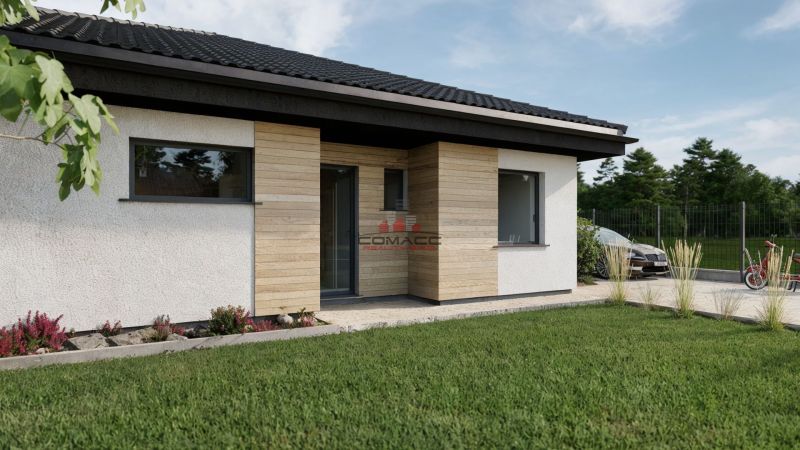 4iz NOVOSTAVBA RD  Drahovce - Rodinný dom na Kostolnej ulici v Drahovciach s dreveným obkladom a udržiavanou záhradou.