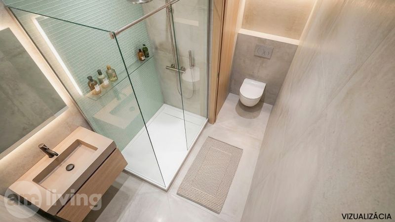 NOVINKA - 2 izbový + loggia + výťah v meste NOVÁ DUBNICA - Kúpeľňa v 2-izbovom byte so sprchovým kútom, umývadlom, toaletou a podložkou.