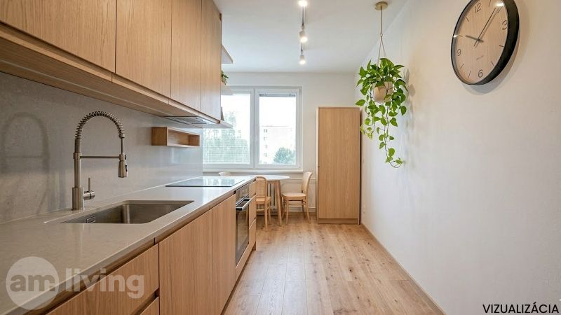 NOVINKA - 2 izbový + loggia + výťah v meste NOVÁ DUBNICA - Kuchyňa s linkou a jedálenským stolom. Podlaha s dreveným dekorom, nástenné hodiny.
