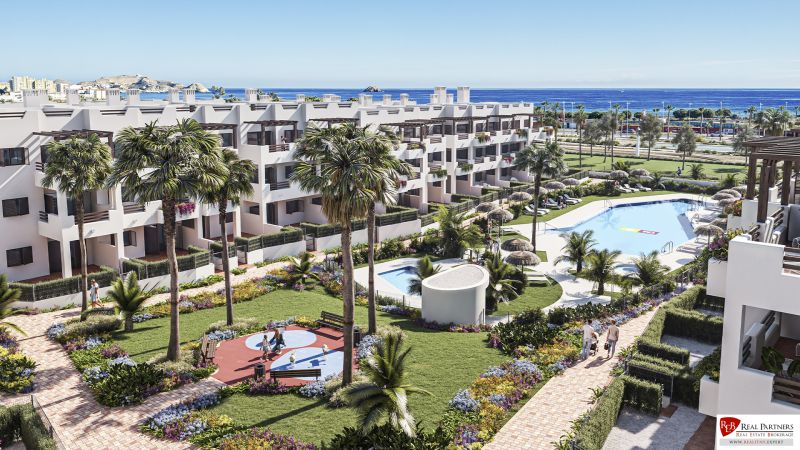 1-izbový apartmán pri pláži, Pulpí, Costa de Almería - Palmy, bazén a záhrady v rekreačných apartmánoch Pulpí s výhľadom na more.