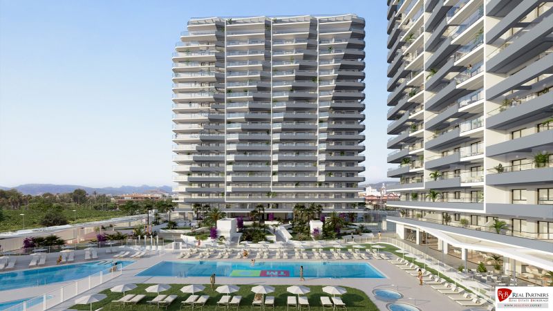 1-izbový apartmán pri pláži, Canet, Costa de Valencia - Rekreačný apartmán v Canet d'En Berenguer so záhradou a bazénom pri obytných vežiach.