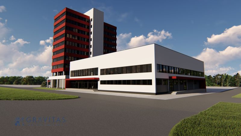 FORVIN TOWER - Predaj administratívnej budovy, Veľký Krtíš - Budova na ulici s logom leva, Zvláštne nehnuteľnosti, trávnik, modrá obloha.