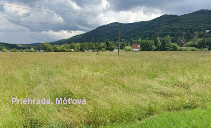 Pozemky 300m2-5000m2 pri priehrade, pôda, les- urbár. Môťová - Rekreačné pozemky v Môťovej, Zvolen, s výhľadom na zelenú krajinu a hory.