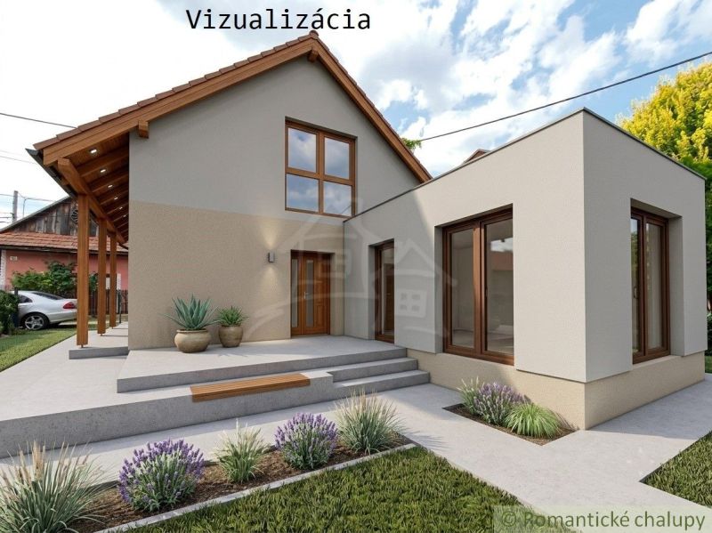 Dom s chalupárskou atmosférou s nadstavbou v peknom prostredí v obci Š - Rodinný dom v Šútovciach s modernou fasádou, záhradou a parkovaním v pozadí.