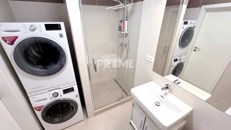 MODERNÝ 3i BYT, NOVOSTAVBA ČEREŠNE, LOGGIA, KLÍMA, PARKING, Polianky - Kúpeľňa s práčkou, sušičkou a sprchovým kútom v 3-izbovom byte.