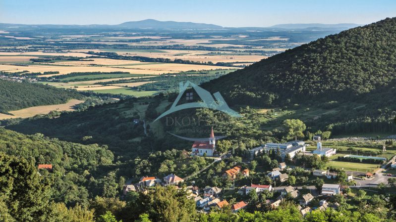 Pozemok (12 812m2) v obci Hrušov okr. Veľký Krtíš.