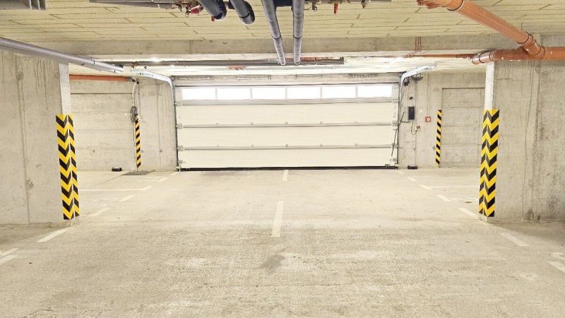 Novostavba - 3- izb. byt s 2 balkónmi a garáž. na ul. Jána Ondruša - Podzemné parkovisko na Ulici Jána Ondruša v Stupave s miestom pre viac áut.