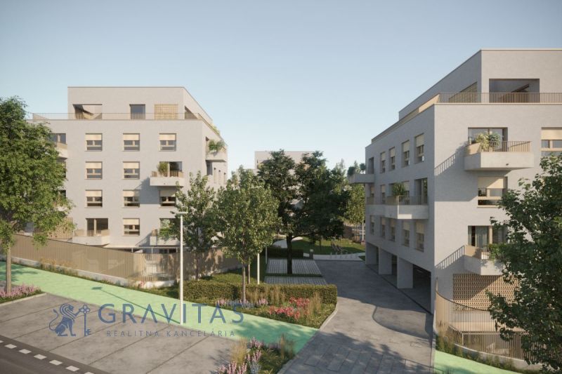  Na predaj 4-izbový byt s predzáhradkou - A-1 - Na obrázku sú tri moderné bytové budovy s krásnym a upraveným okolím.
