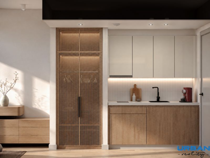 Hotelový a rezidenčný komplex THE TERRACE v Paje, Zanzibar - Kuchyňa vo výstavbe bytov s podlahou s dreveným dekorom a úložným priestorom.