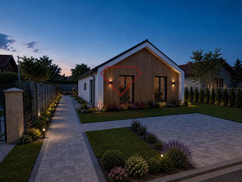 MODERNÝ 4-IZBOVÝ RODINNÝ DOM V ŠTÝLE BARNHOUSE – Veľká Mača  - Veľká Mača: Rodinný dom na ulici Veľká Mača s osvetleným chodníkom a záhradou.