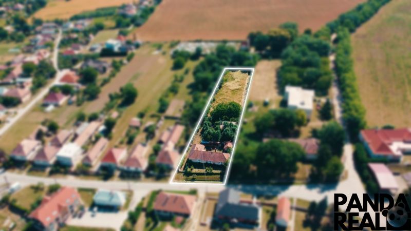 INVESTIČNÁ PRÍLEŽITOSŤ- pozemok 3 200 m² s rodinným domom, Čermany - Pozemky - bývanie v Čermanoch s výhľadom na domy a zeleň.