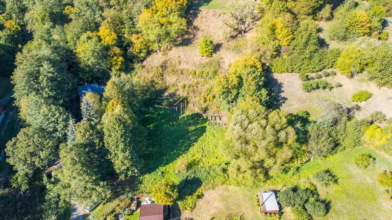 Predaj, rekreačné pozemky Štiavnické Bane - Zalesnené rekreačné pozemky v Štiavnických Baniach, ideálne pre relax a oddych.